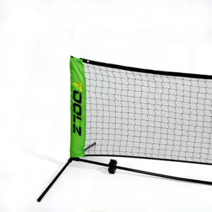 A group of people playing padel with a net and rackets.